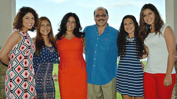 Al Adi with his wife and four daughters