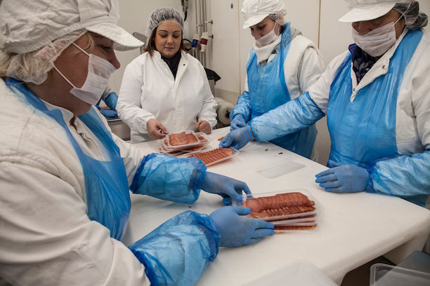 Meat packing workers in Sopot, Serbia, December 2016. Photo: UN Women Europe and Central Asia/Rena Effendi. via Flickr.