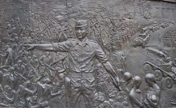 Image of Major General (later President) Suharto restoring order at the monument to the seven murdered army officers. Photo: Vannessa Hearman
