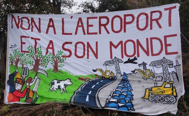 Sign from the re-occupation demonstration, November 2012. via Justice Spatiale.