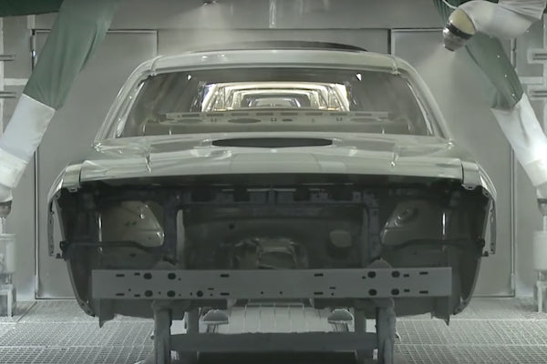 Dodge Challenger on the assembly line, 2016. via YouTube.
