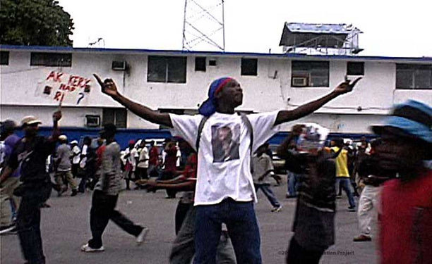 Pro-Lavalas demonstrators protest UN forces in Bel Air, September 2004. via Kevin Pina and the Haiti Information Project.