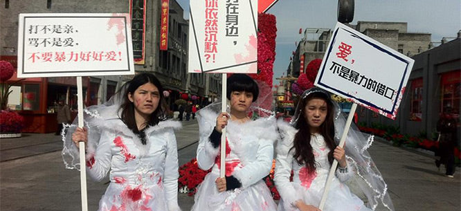 Li Maizi, one of China's "Feminist Five", at a Beijing protest against domestic violence, 2012