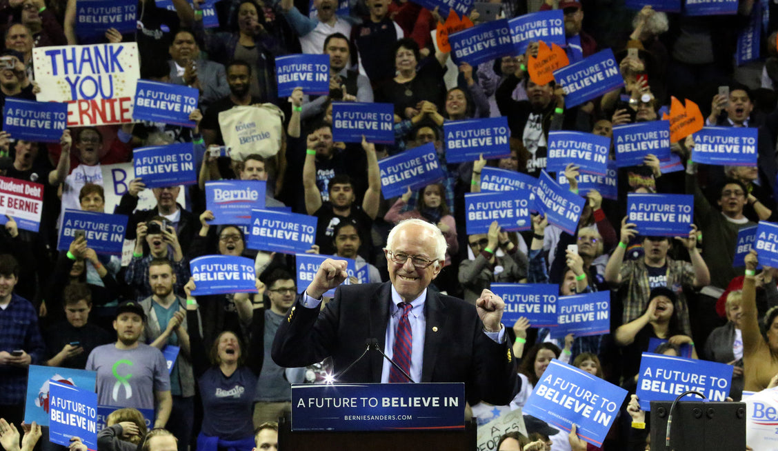 Bernie Sanders and supporters at a primary campaign rally in 2016.