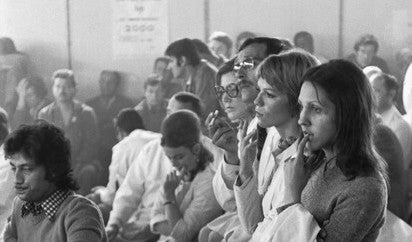 Lip workers at a meeting, 1973, photo by Henri Cartier-Bresson