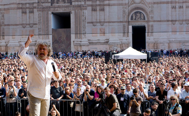 Beppe Grillo address a Five Star Movement rally in Piazza Maggiore, Bologna. May 7, 2011. Photo: Kirsten de Graaf. via Flickr. 