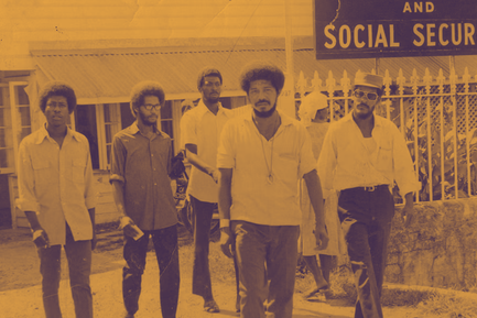 Walter Rodney and W.P.A members exit the Ministry of Labour & Social Security, Guyana, 1970s via Wikimedia Commons