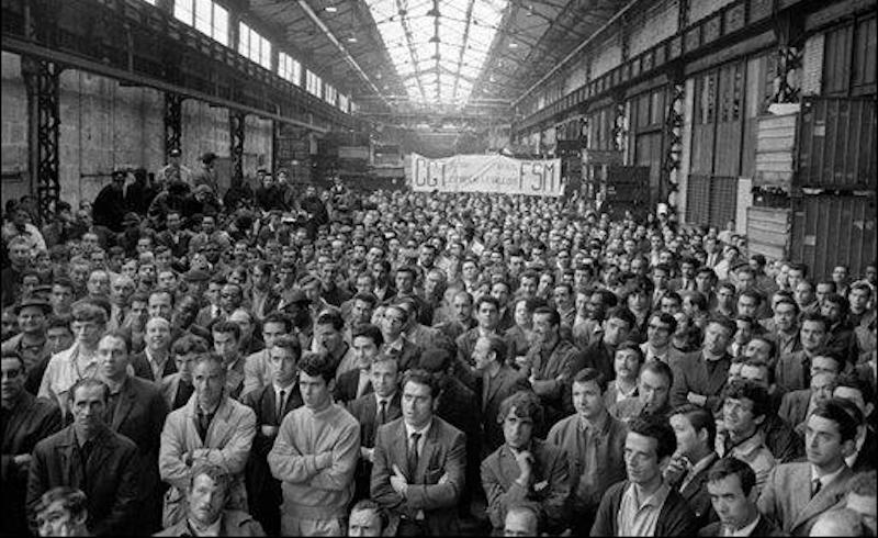 Striking Citroën workers listen to a CGT representative, May 24, 1969.