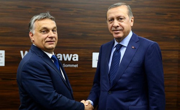 Hungarian Prime Minister Viktor Orbán and Recep Tayyip Erdoğan shake hands at a NATO summit in Warsaw, July 2016. 