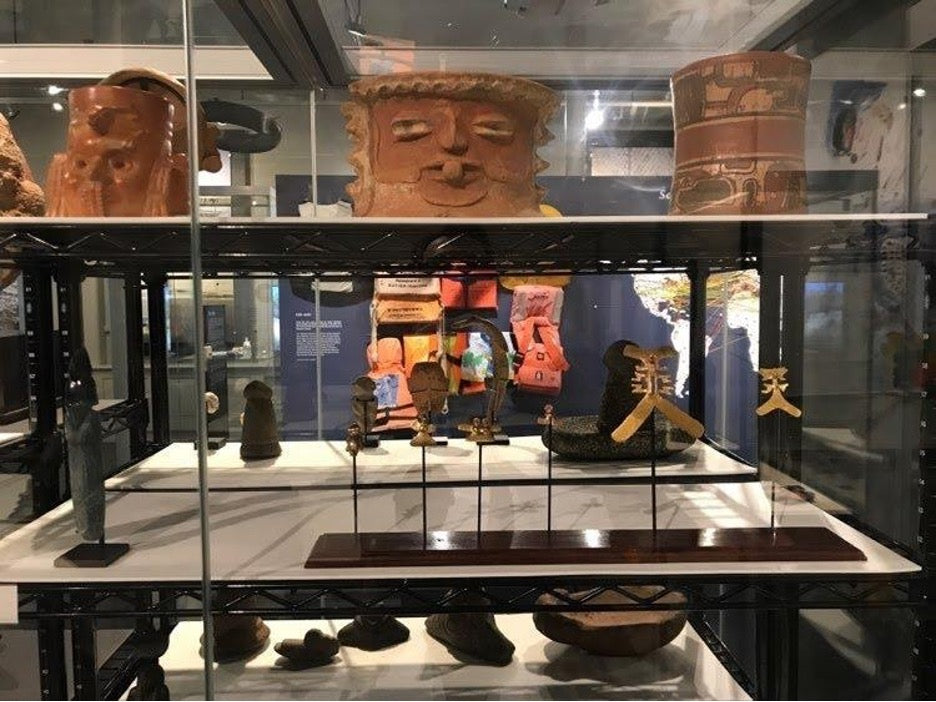 Mesoamerican archaeological objects and lifejackets from Lesvos, used by border crossers attempting to enter the EU. “Transient Matter,” Haffenreffer Museum, Brown University. (Photo by author)