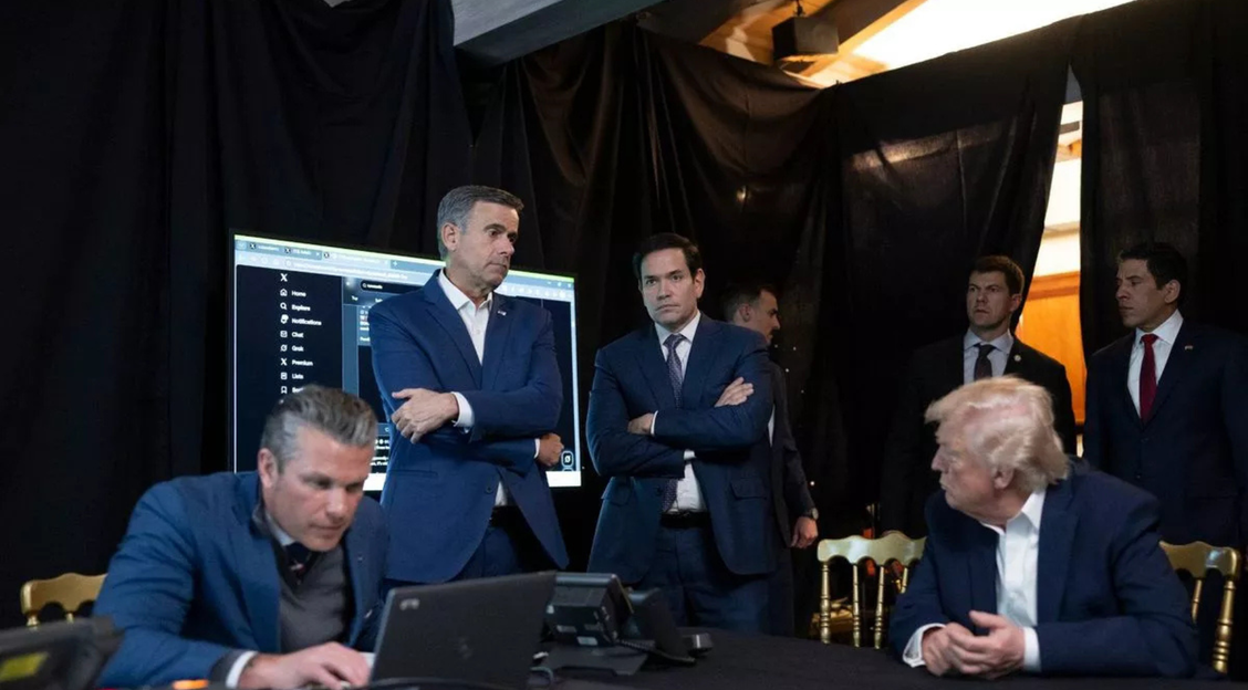Donald Trump, Pete Hegseth, Marco Rubio and John Ratcliffe assembled in a makeshift situation room at Trump's Mar-a-Lago estate. Pete Hegseth can be seen scrolling through the "Venezuela" mentions on X.com.