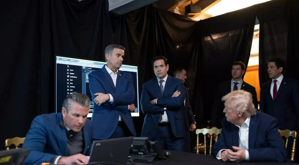 Donald Trump, Pete Hegseth, Marco Rubio and John Ratcliffe assembled in a makeshift situation room at Trump's Mar-a-Lago estate. Pete Hegseth can be seen scrolling through the "Venezuela" mentions on X.com.