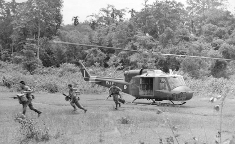 Malaysian Rangers patrol the Malaysia-Thailand border, 1965. via Wikimedia Commons. 