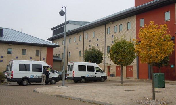 Reliance "escorting service" vans in Harmondsworth. via Corporate Watch. 