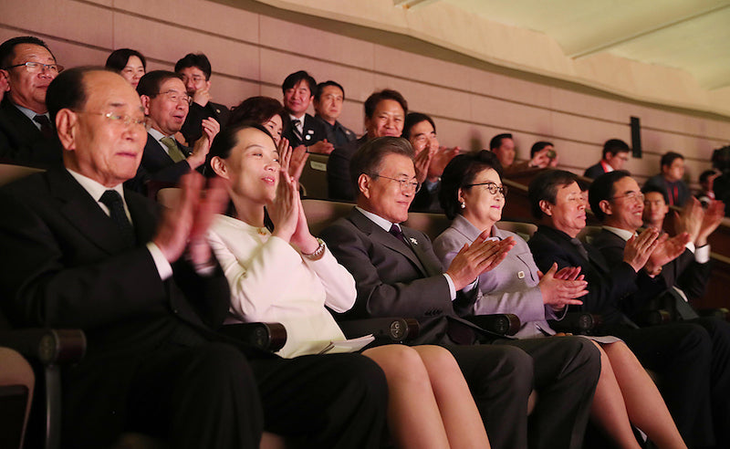  Kim Yong-nam, Kim Yo-jong, Moon Jae-in, and Kim Jung-sook watch a performance by North Korea's Samjiyon Orchestra, 11 February. via Wikimedia Commons.