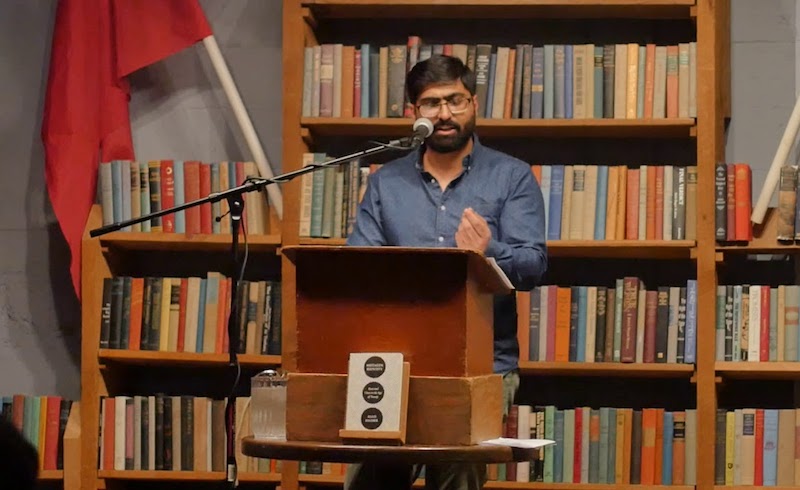 Asad Haider speaking in Seattle, May 2018. via YouTube.