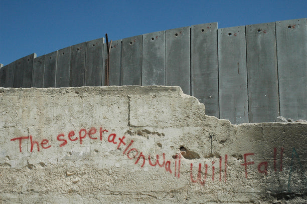 Graffiti near the border wall, Israel, 2011.