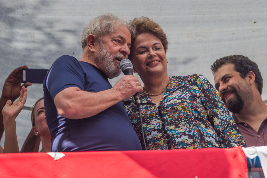 Former president Luiz Inácio Lula da Silva, with impeached former president Dilma Rousseff, speaks to supporters at the headquarters of the Metalworkers' Union on April 7, 2018 in São Paulo, Brazil. (Victor Moriyama / Getty Images)
