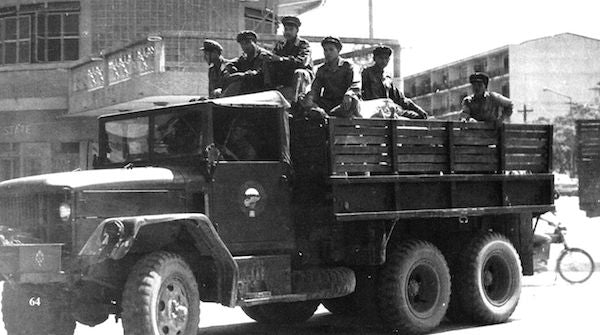 Pathet Lao soldiers, Vientiane, 1973. via Wikimedia Commons.