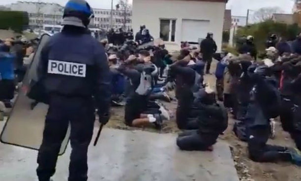 Police force students in Mantes-la-Jolie to their knees during a protest on 6th December 2018.
