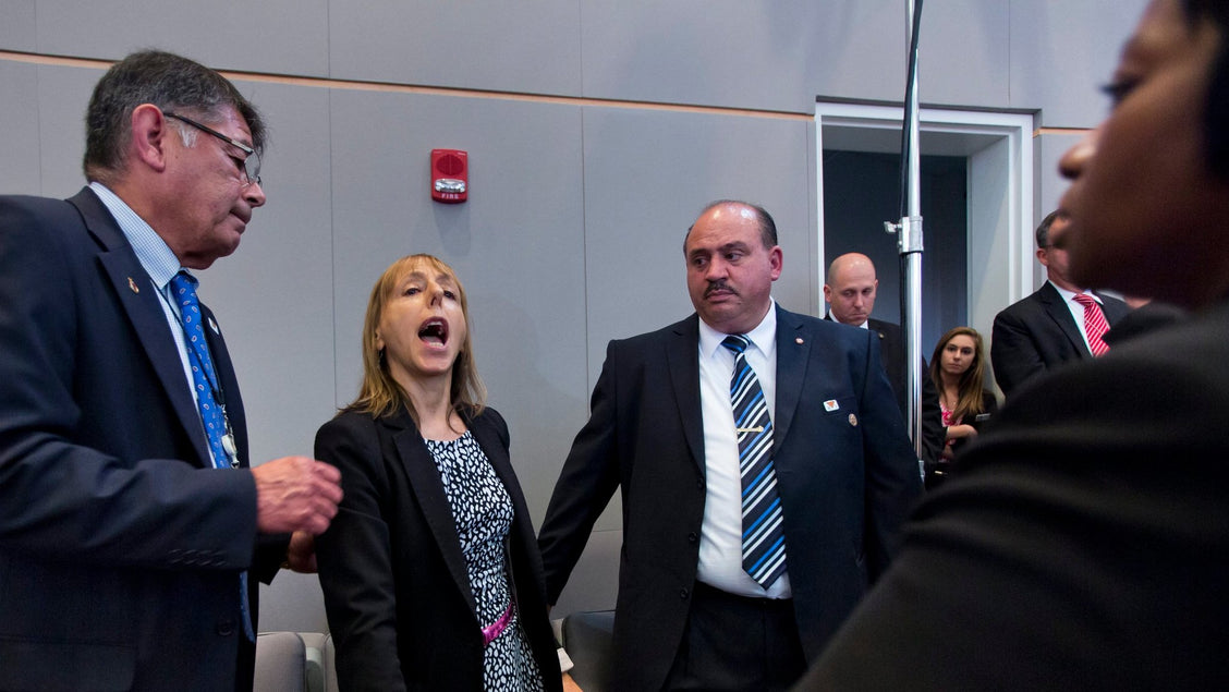 Image for blog post entitled Medea Benjamin spars with Obama over the use of drones